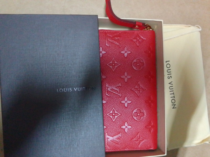 品名: Louis Vuitton LV M60297 SECRET 經典花紋皮革壓紋拉鍊長夾